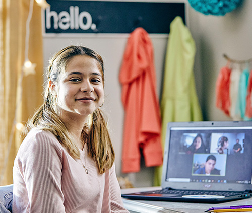 happy girl in a virtual class